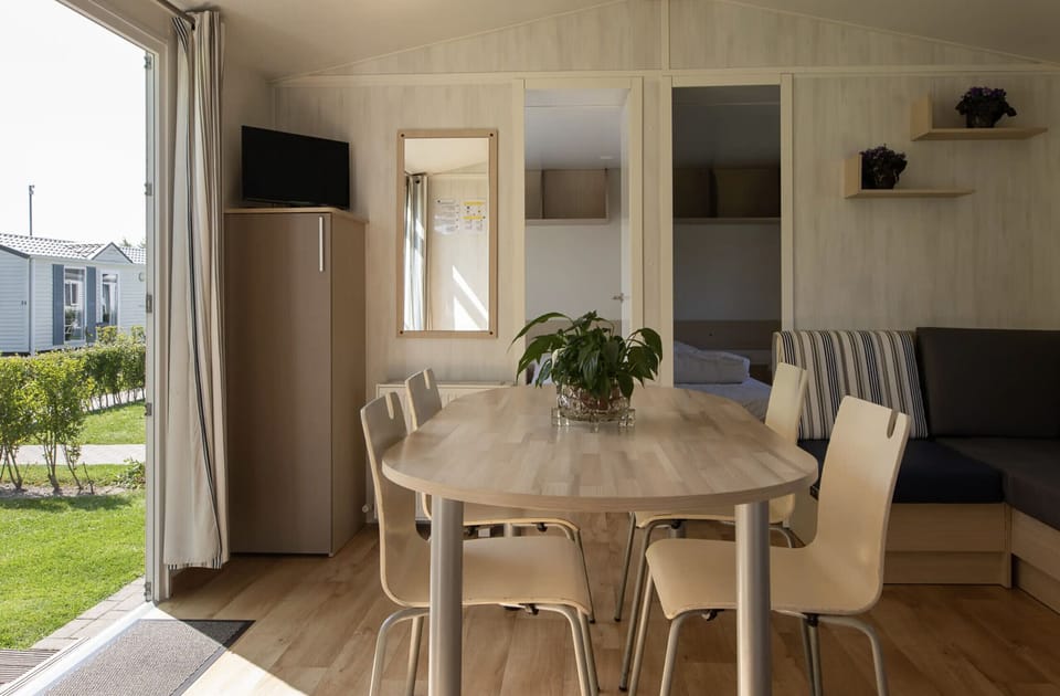 Dining room from Vakantiepark Klein Strand - Comfort Chalet 6p