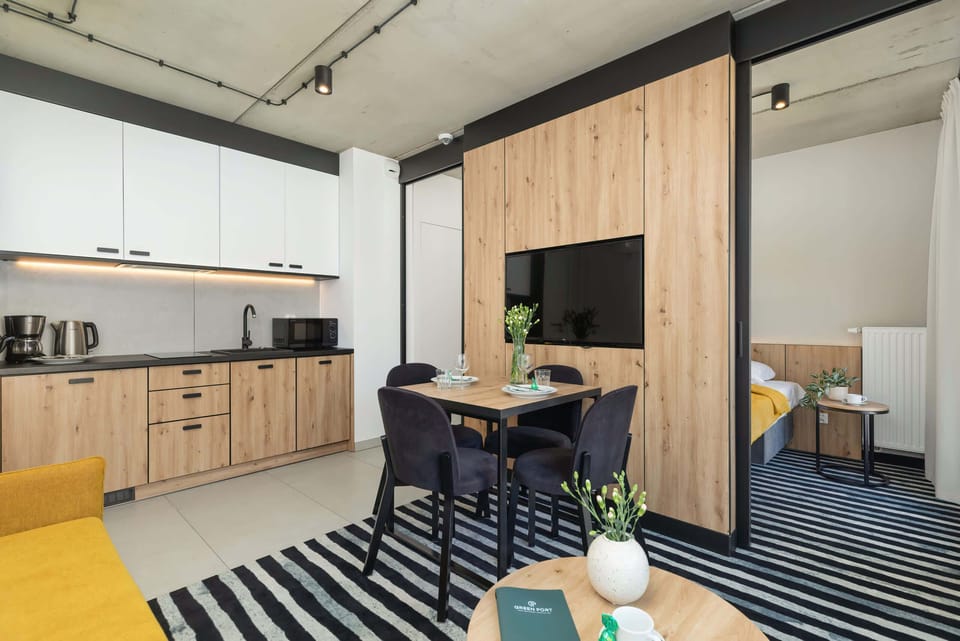 Bright kitchen with cooking utensils. 