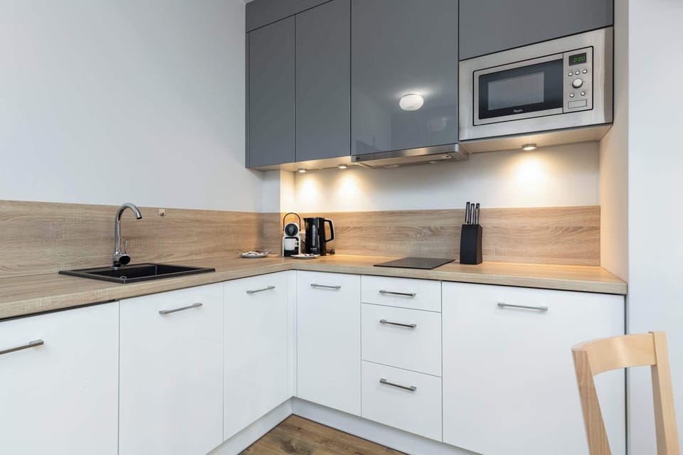 Kitchenette with microwave.