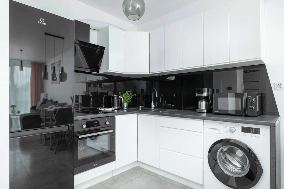 The fully equipped kitchenette includes everything you need for a home-cooked meal.