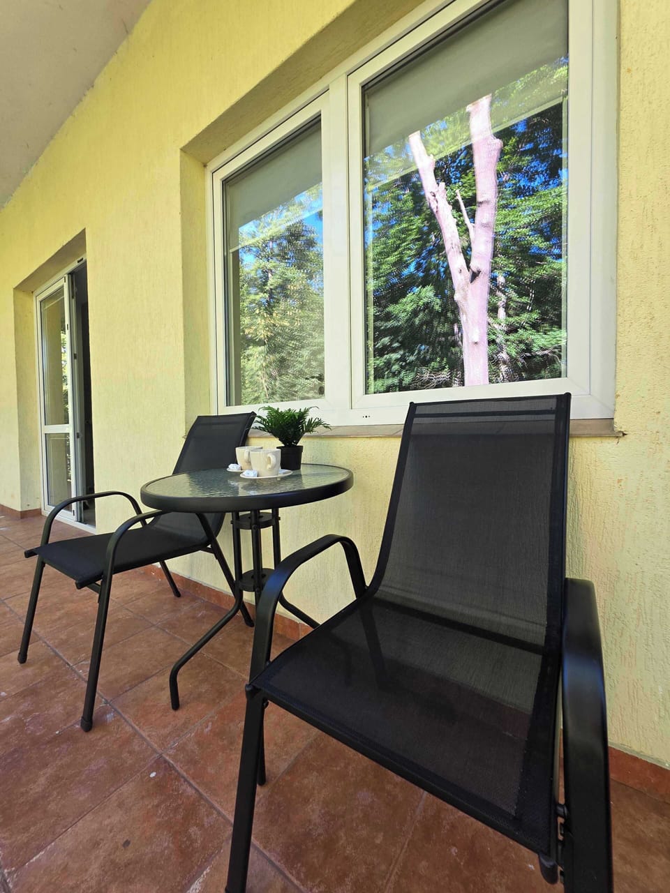 A close-up of the patio furniture on the balcony.