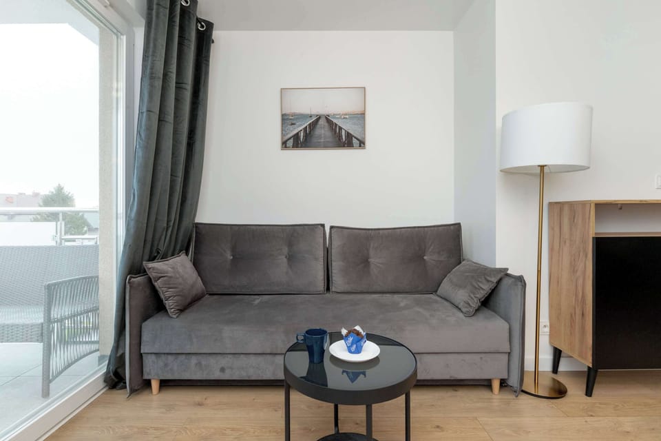 The living room offers a perfect blend of comfort and modern style.