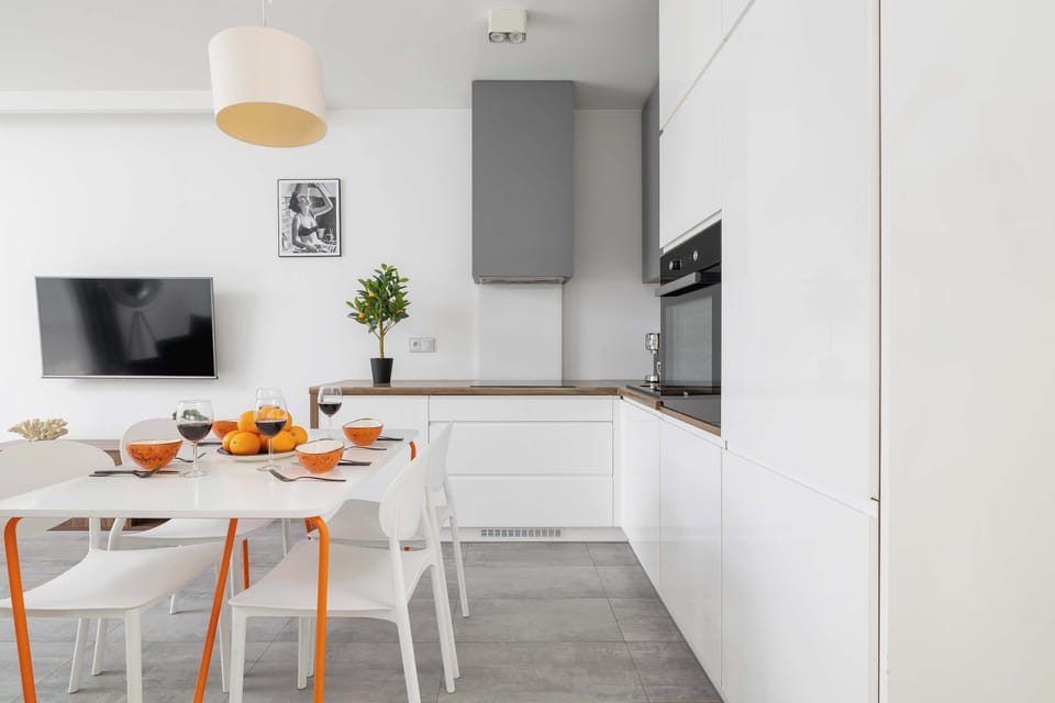 Cook and dine in style with the modern kitchenette and dining area.