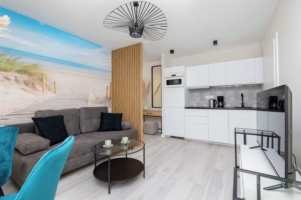 The living room's beautiful design complemented by natural light streaming in.
