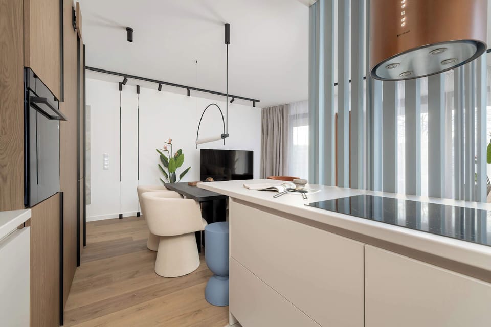 Cook and dine in style with the modern kitchenette and dining area.