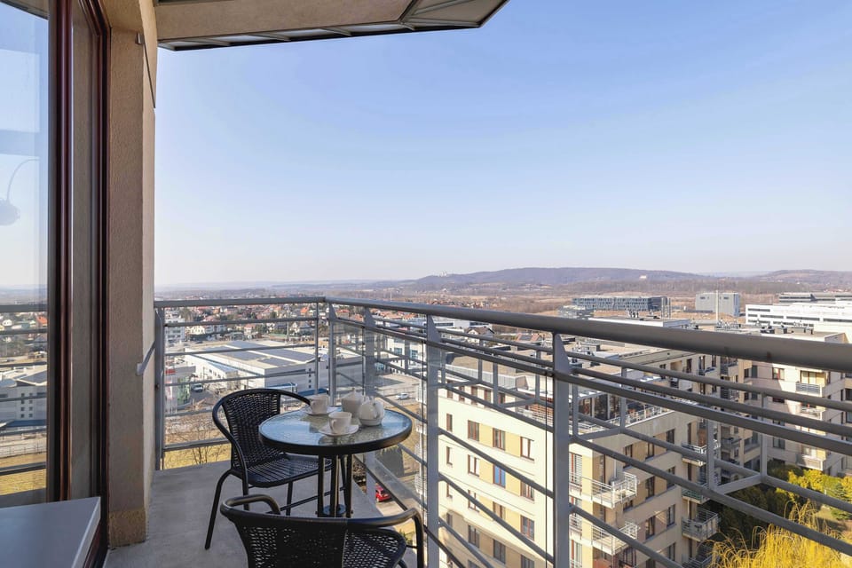 The balcony provides a perfect spot for enjoying the fresh air.