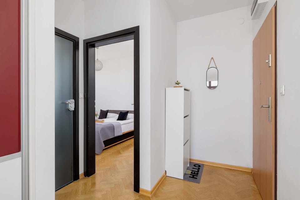 The living room's sleek design is both functional and aesthetically pleasing.