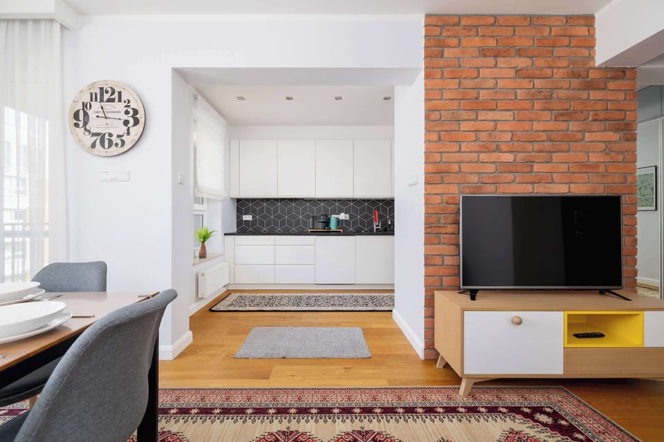 Living room with an access to cable television, which makes an evening entertainment and relax easy and nice.