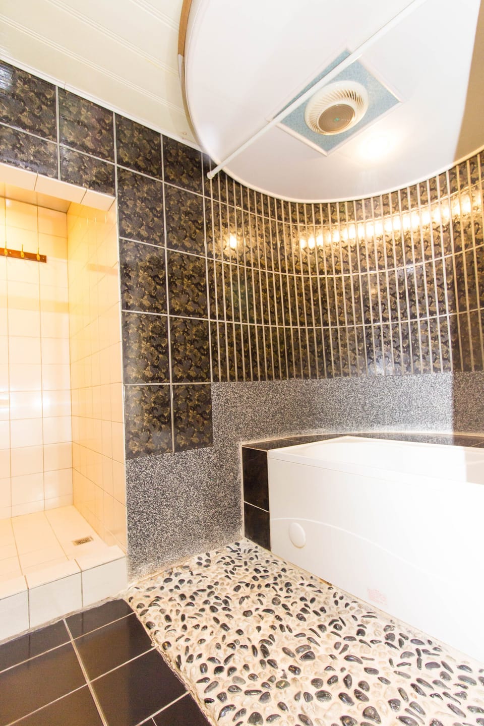 Separate tub and shower, free toiletries, hair dryer, slippers