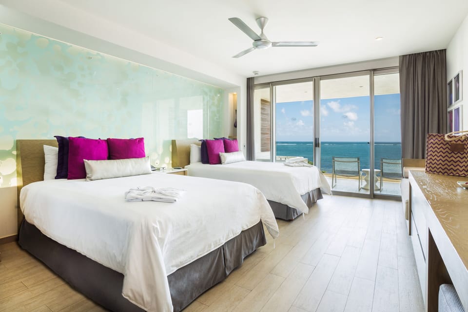 Xhale Club Junior Suite Ocean Front Whirlpool Double | Minibar, in-room safe, desk, laptop workspace