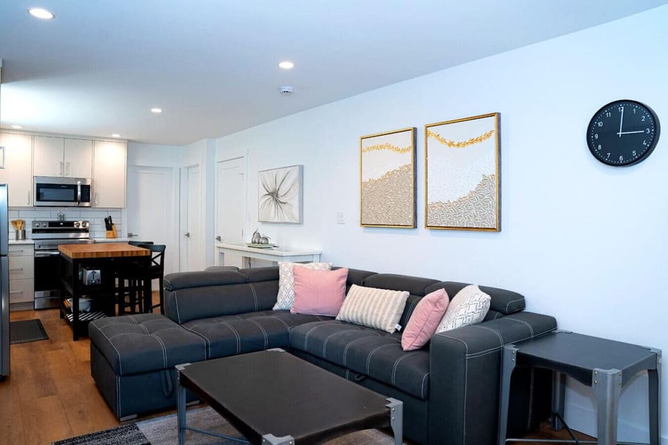 Living room with a comfortable couch, and a Smart TV