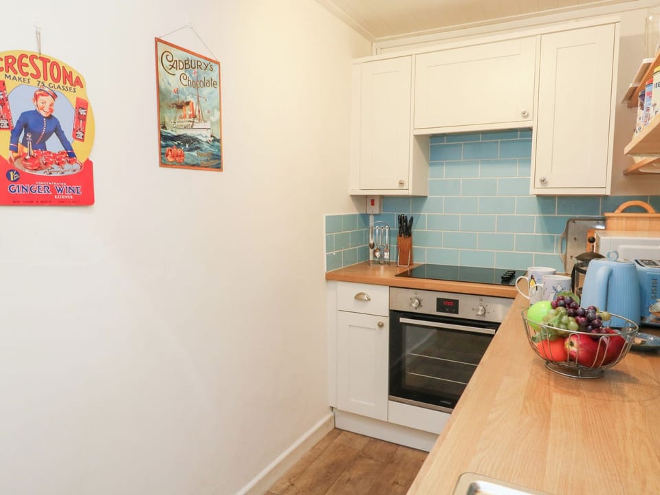 Fridge, microwave, toaster, cookware/dishes/utensils