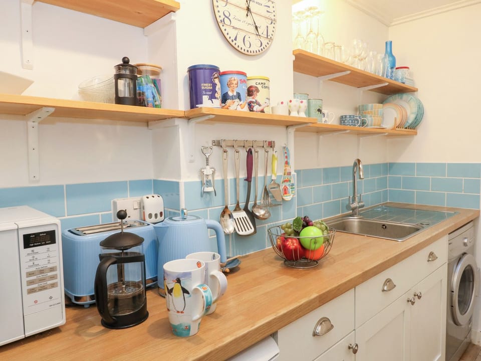 Fridge, microwave, toaster, cookware/dishes/utensils