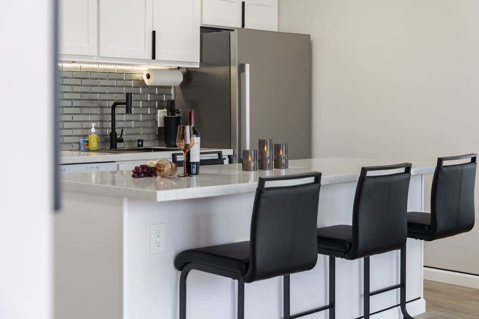 Enjoy the convenience and style of a modern kitchen, ready for your morning coffee or evening cocktails.