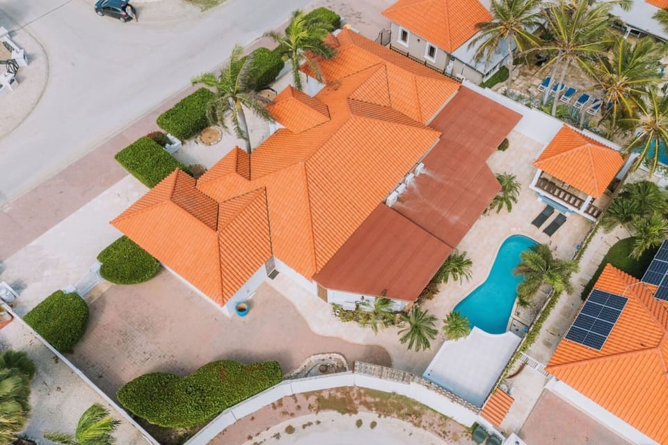 Villa Z welcomes you with its charming exterior and tropical landscaping, giving you an immediate sense of island relaxation.