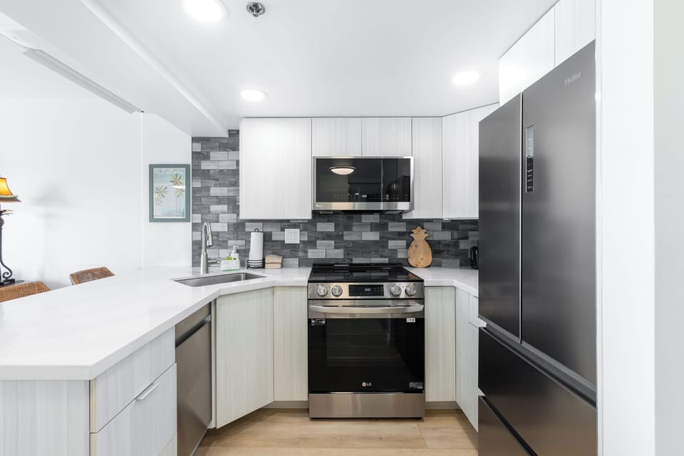 Stainless steel appliances and all the cooking essentials you need to chef it up in paradise!