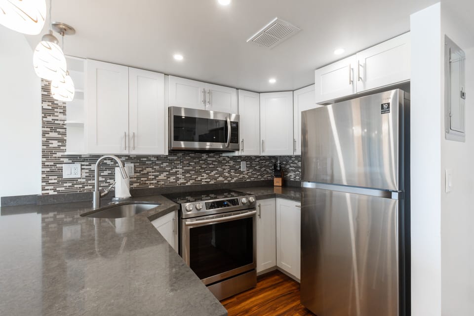 Fully equipped kitchen with stainless-steel appliances