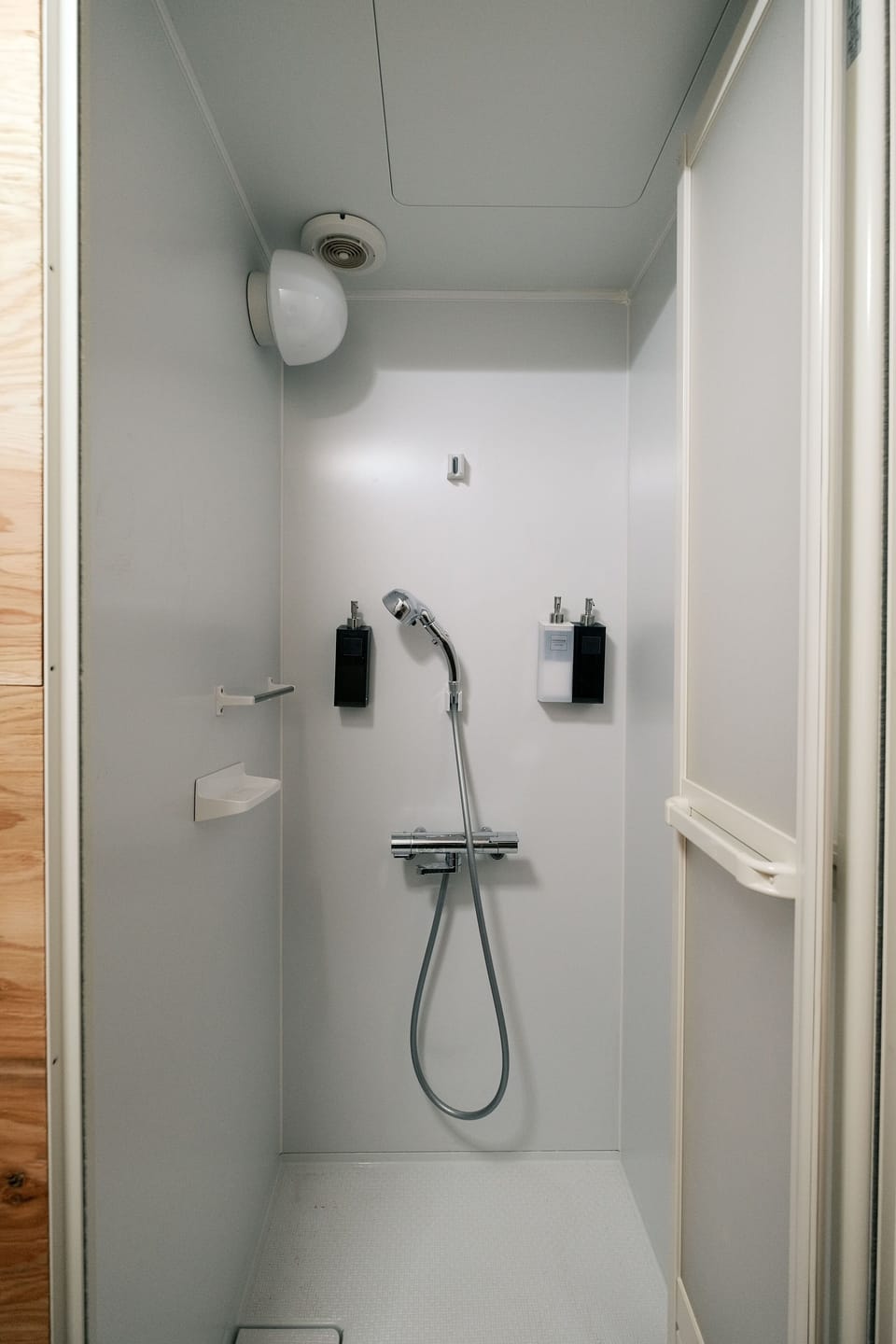 Basic Shared Dormitory, Housekeeping | Bathroom | Shower, hair dryer, soap, shampoo