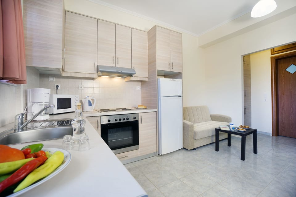 Apartment, 1 Bedroom | Private kitchen | Full-size fridge, microwave, oven, stovetop