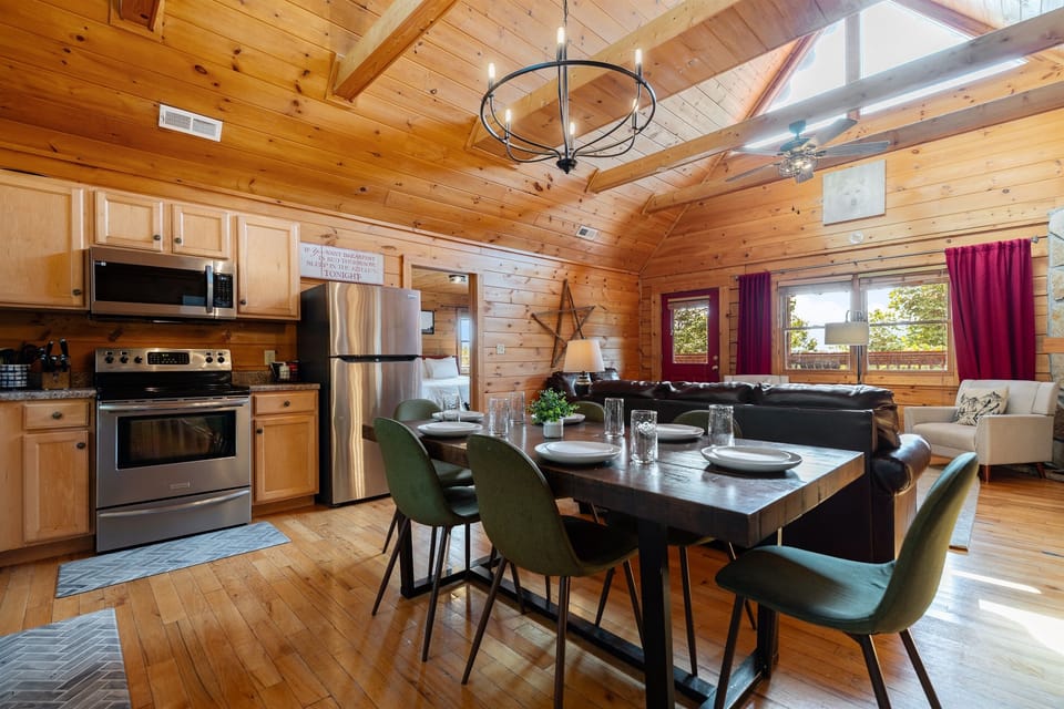 Fully equipped kitchen with stainless steel appliances, cookware, coffee maker, and everything you need to cook or unwind at home.