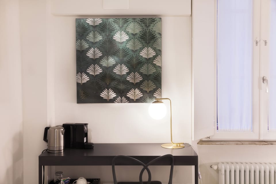 Classic Room, Courtyard View | In-room safe, desk, laptop workspace, blackout drapes