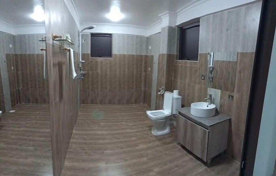 Single Room, City View | Bathroom | Shower, bathrobes, slippers, towels