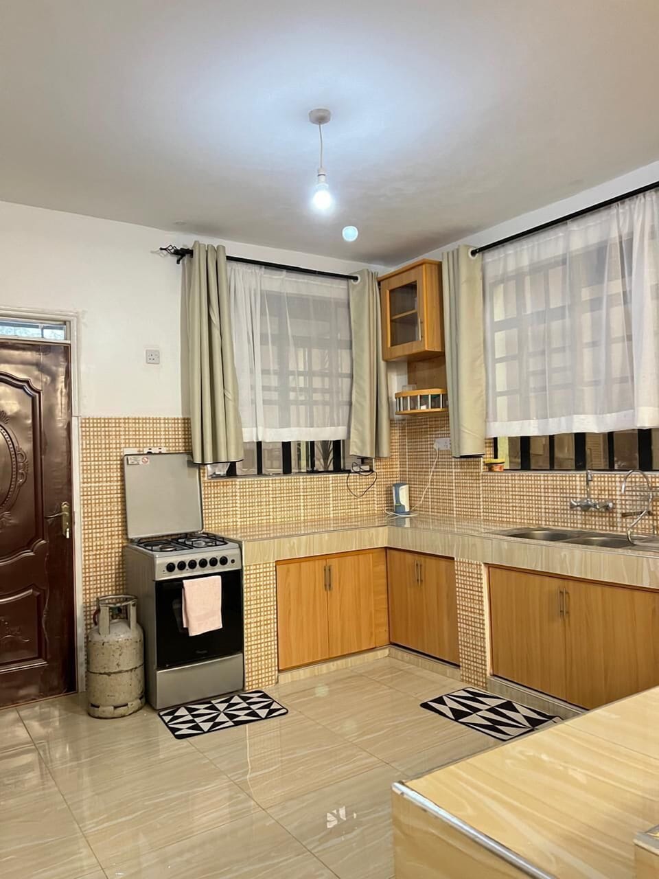 Deluxe Apartment, Garden View | Private kitchen | Fridge, microwave, cookware/dishes/utensils