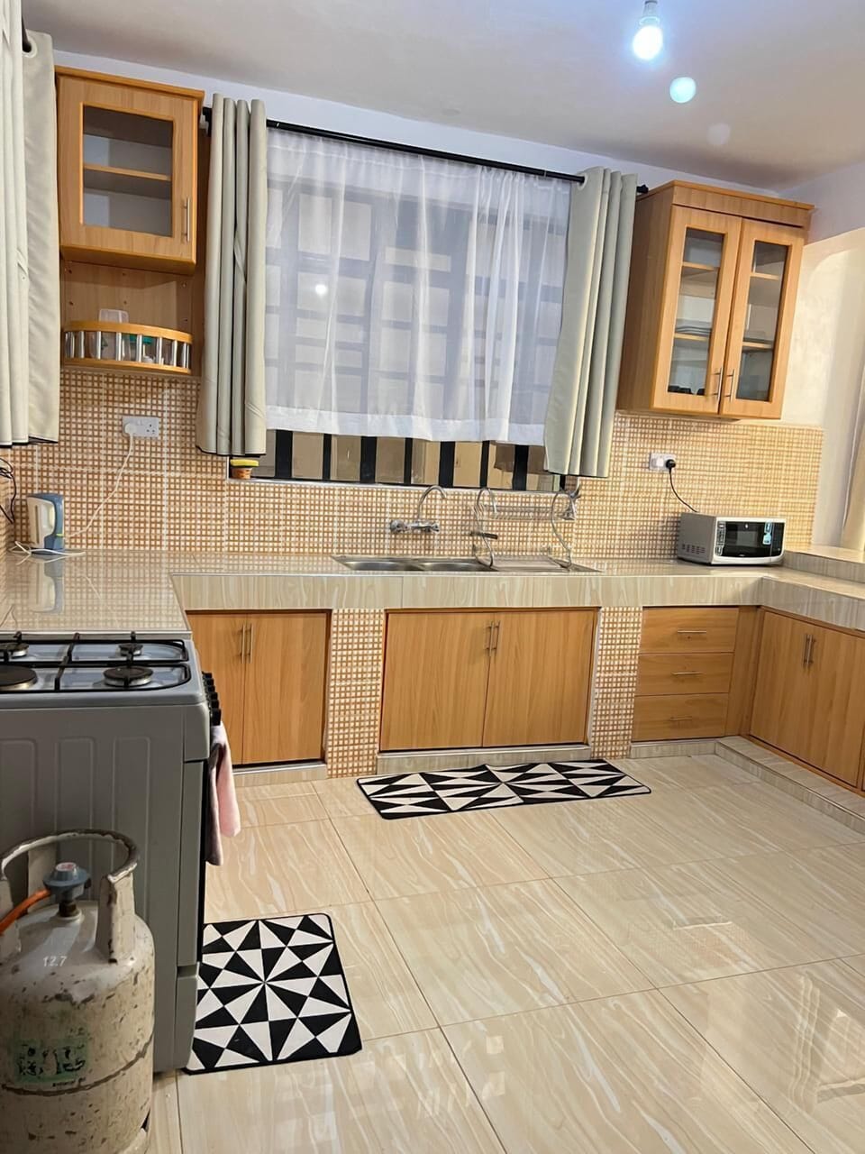 Deluxe Apartment, Garden View | Private kitchen | Fridge, microwave, cookware/dishes/utensils