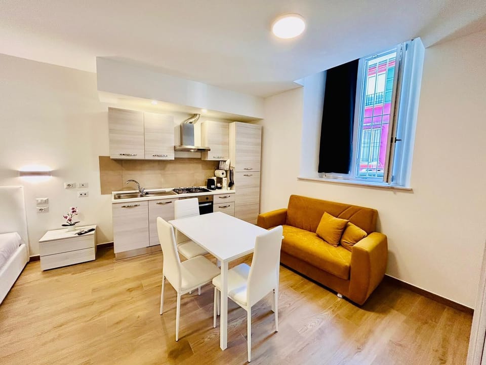Deluxe Studio | Living area | TV