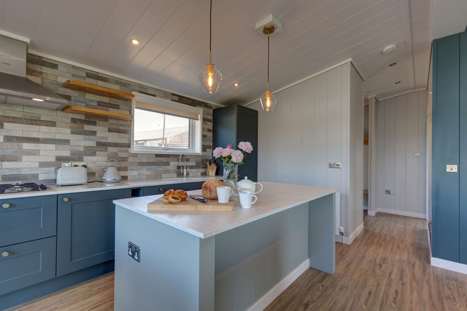 Ground floor: The kitchen is set to one side of the living area