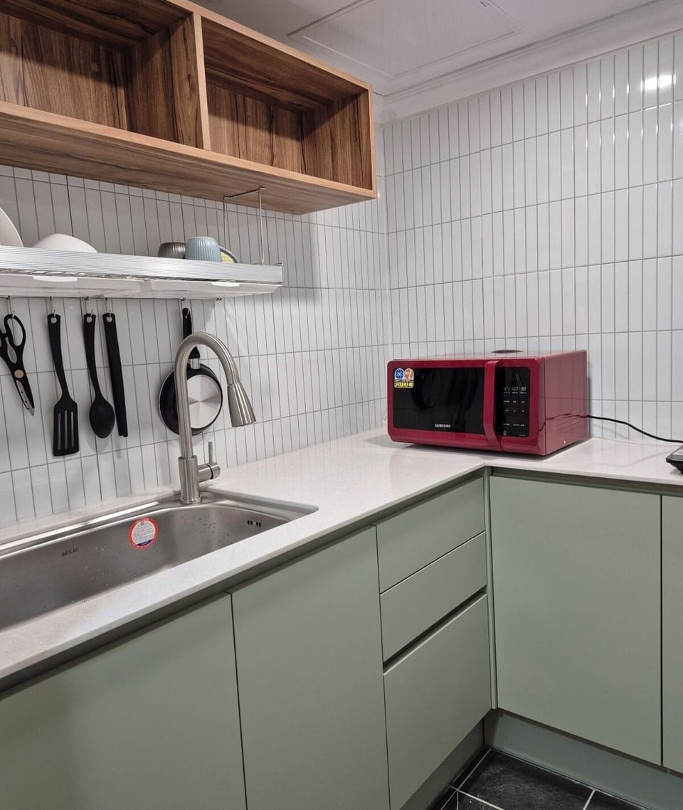 Espresso maker, coffee/tea maker, fridge, microwave