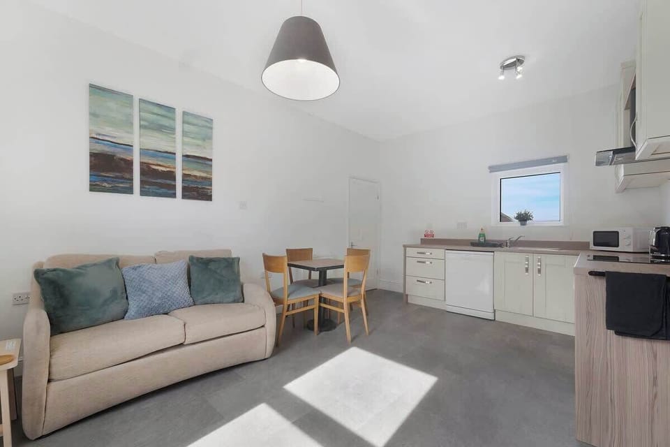 Cosy living room equipped with Sofa bed and a SMART TV with Netflix, plenty of space to sit down and relax.