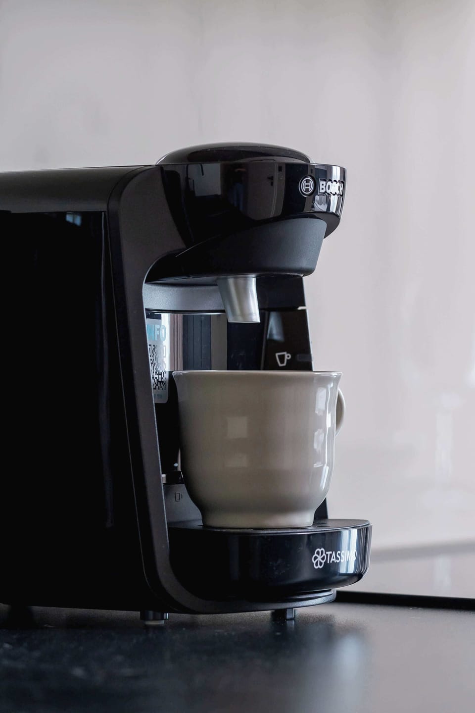 Capsule coffee maker in the kitchenette.