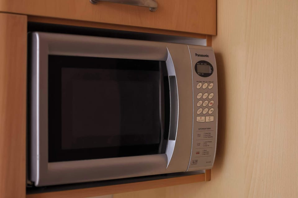 Microwave in the kitchen.