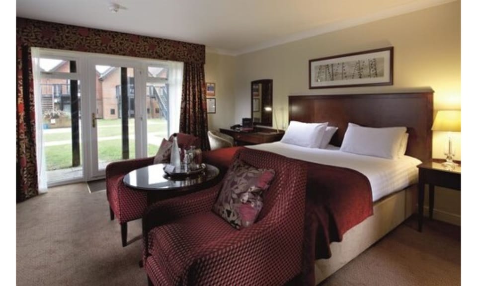 Desk, blackout drapes, iron/ironing board, travel crib