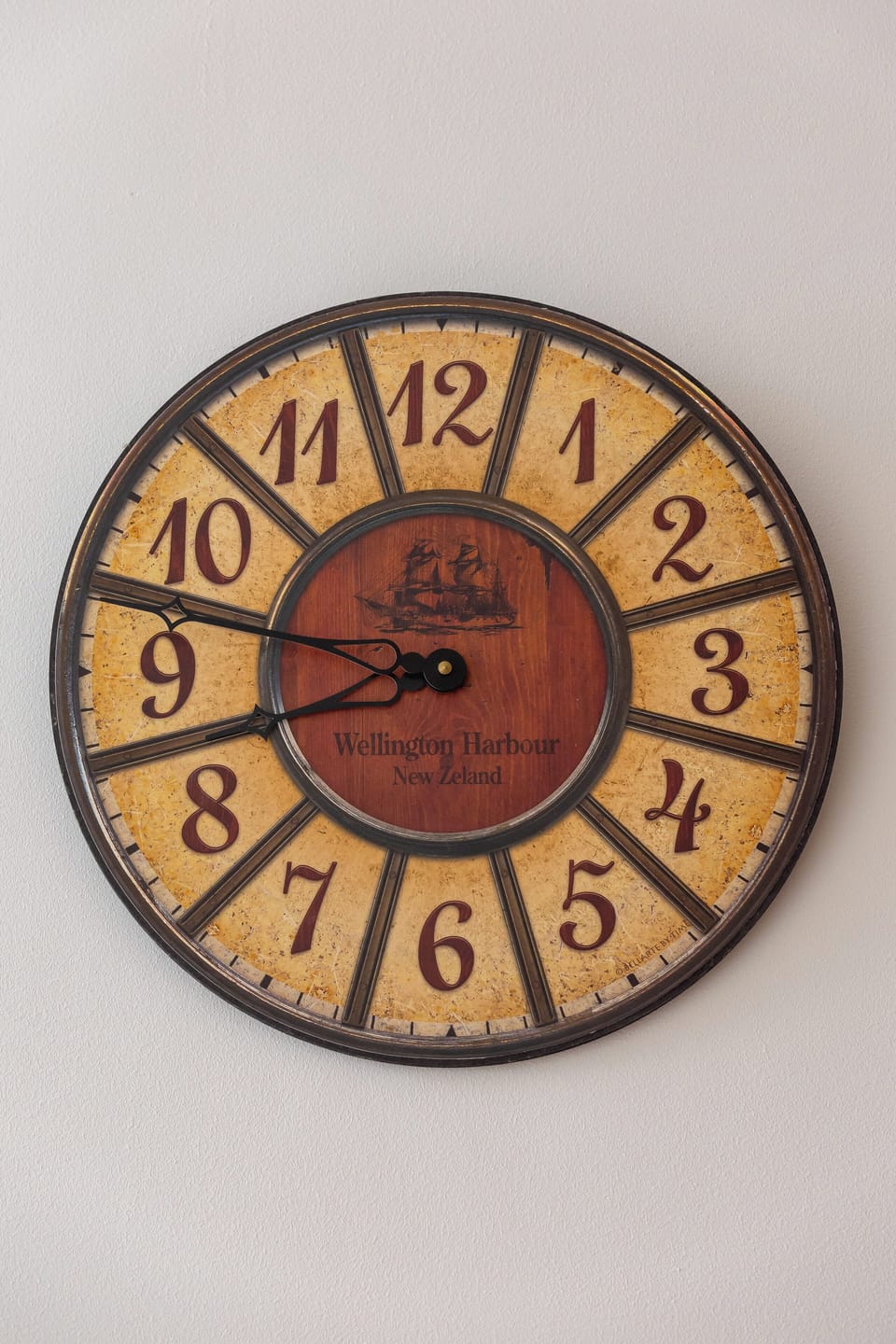 A decorative wall clock with a vintage look, adding character to the space.