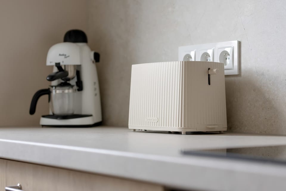 Close-up view of a coffee station area.