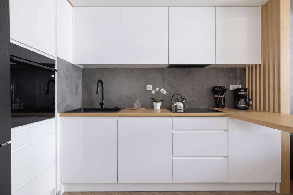 The kitchenette's practical layout maximizes space and functionality.