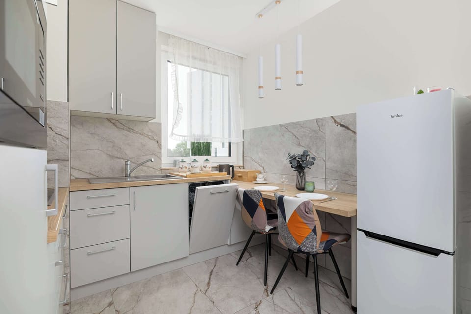 The kitchen also has a dining area that can ideally serve as a meeting place or a place for shared meals.