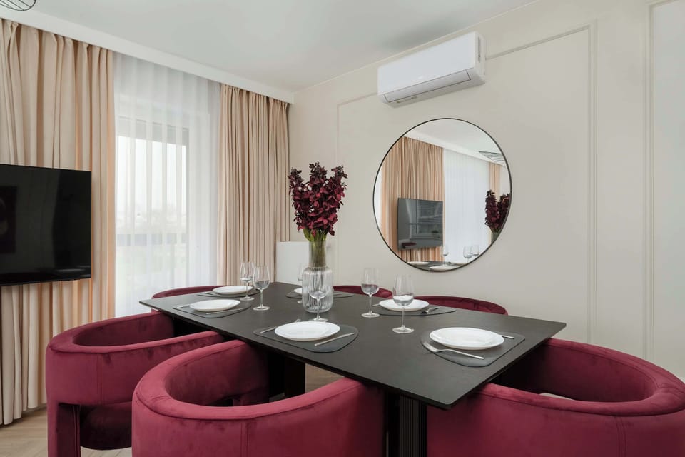 Enjoy your favorite shows on the flat-screen television in the elegant living area.