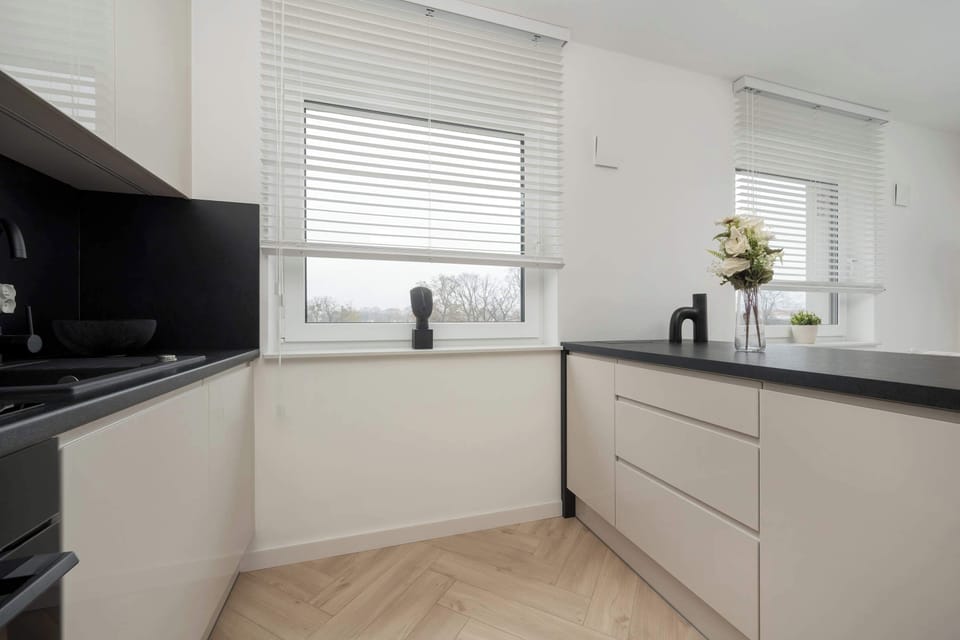 The fully equipped kitchenette includes everything you need for a home-cooked meal.