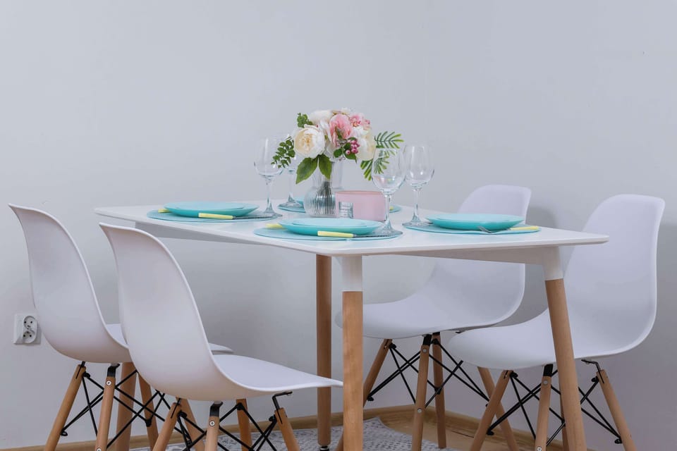 Dining table with tableware.