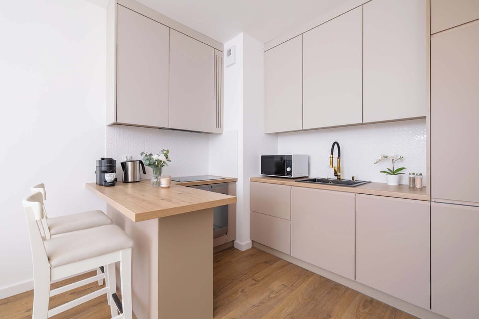 The fully equipped kitchenette includes everything you need for a home-cooked meal.
