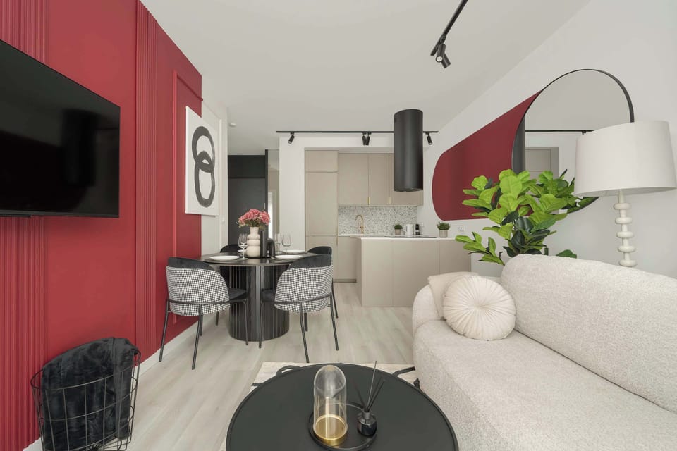 Enjoy your favorite shows on the flat-screen television in the elegant living area.