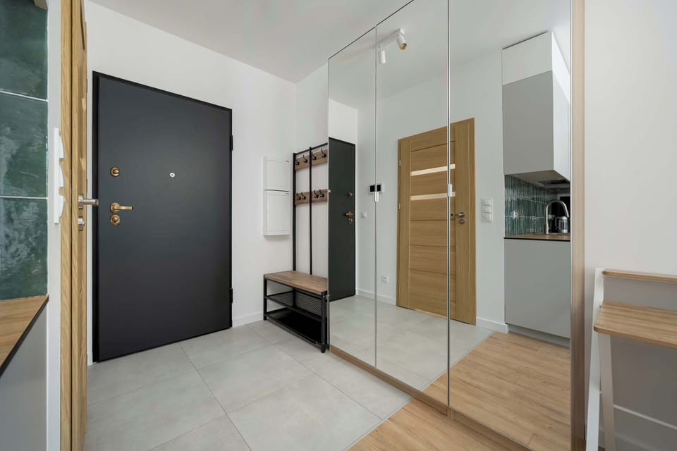 The corridor of the facility with a spacious wardrobe, allowing you to store your belongings in an orderly manner.