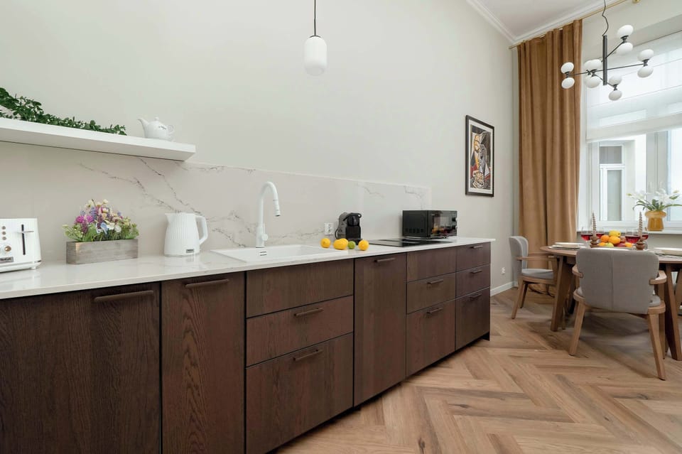 Kitchenette with coffe machine.