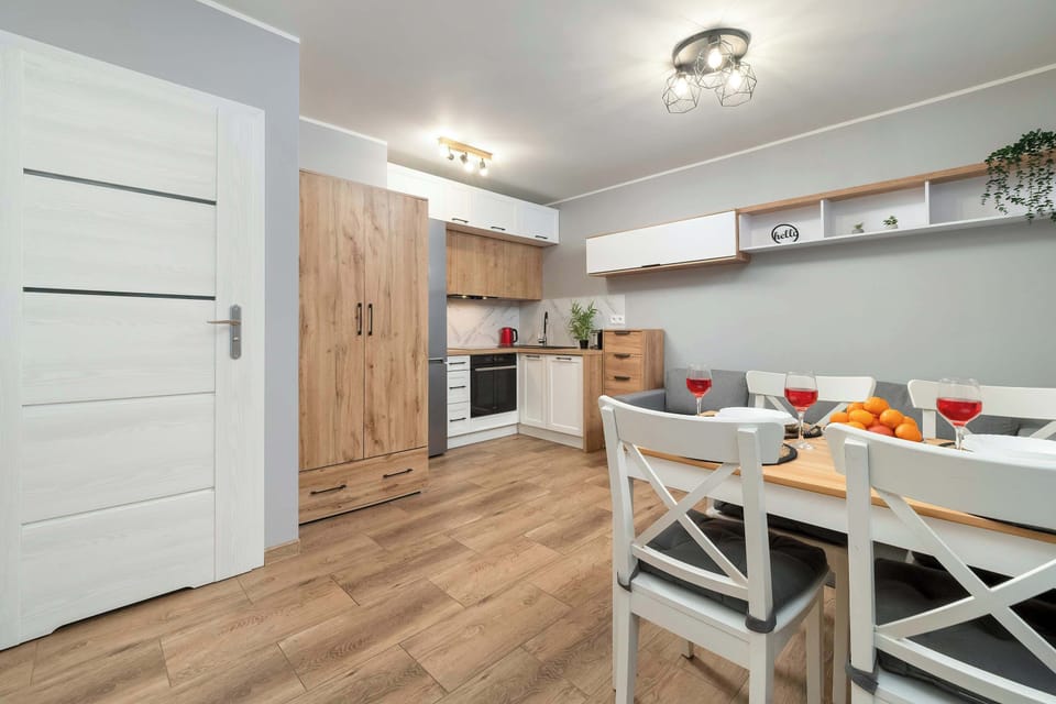 The living area's modern and stylish decor creates a welcoming atmosphere.