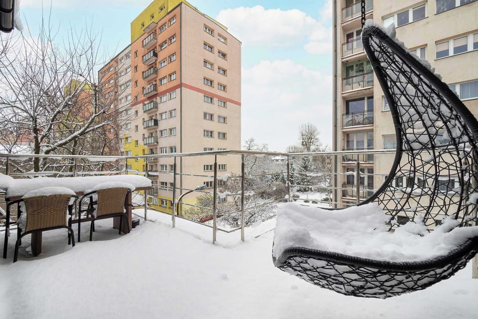 The balcony provides a perfect spot for enjoying the fresh air.