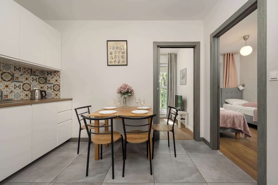 Large table with chairs for eating communal meals. 