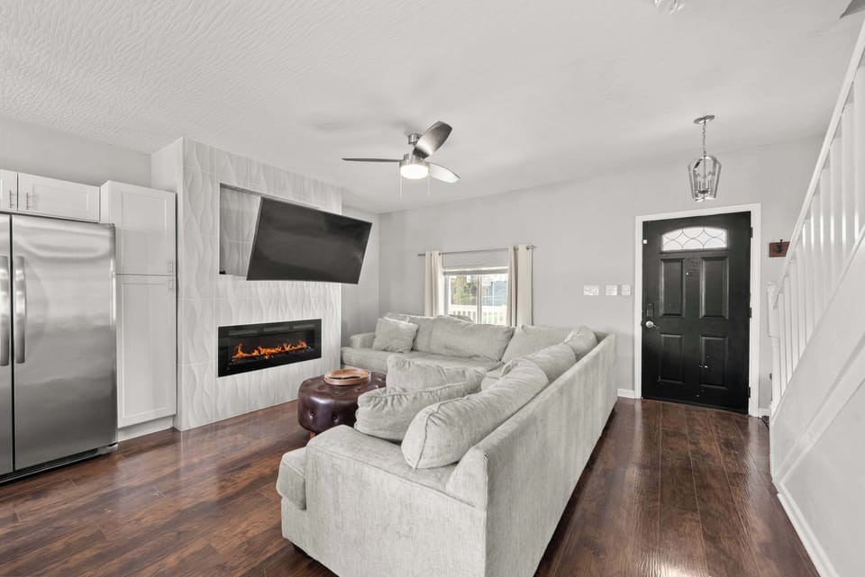 Curl up in the chic living room & stream your favorites on the smart TV​